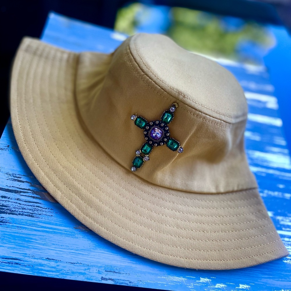 Bucket hat style with rhinestones cross
